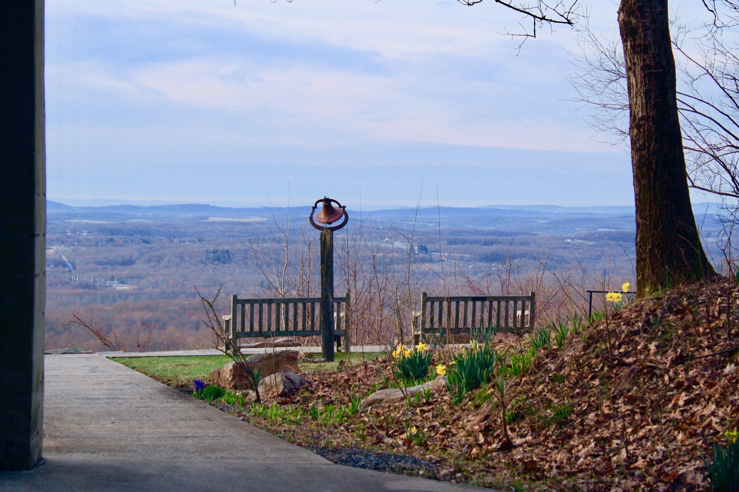 Two benches look out over the ridge below.